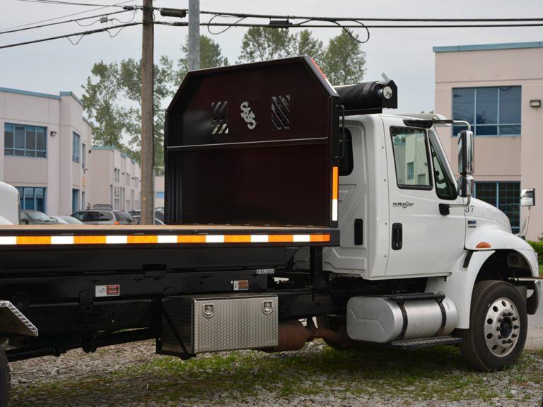 Flat Bed Roll Off Axiom Construction SCS Manufacturing Inc.